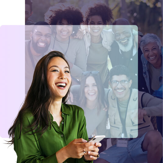 A dog looking at a smiling woman