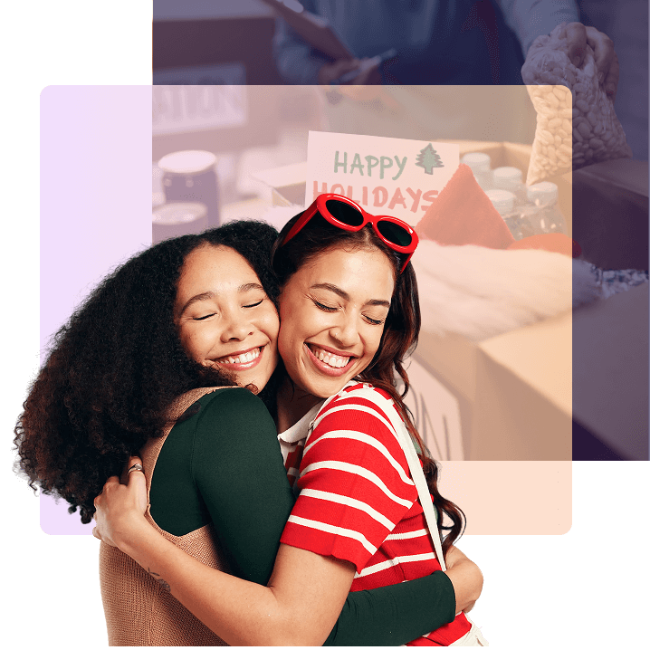 deux femmes qui se serrent dans les bras