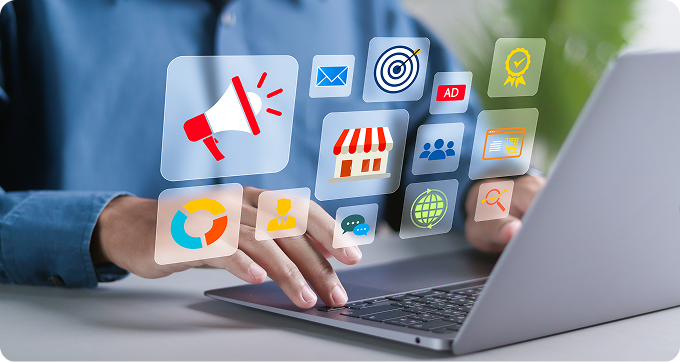 Digital marketing tools displayed above a laptop