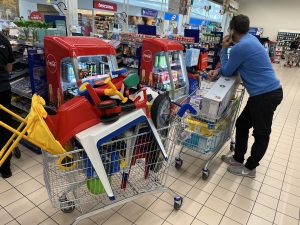 purchasing supplies for Ukraine at the store, toys and more