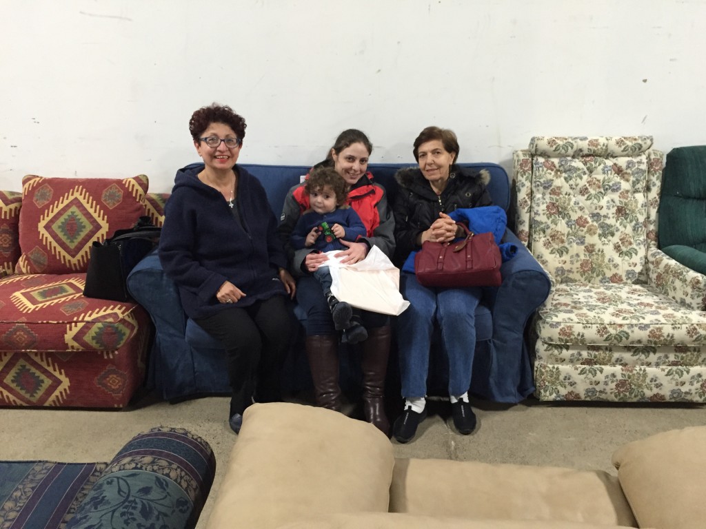 Syrian family with sofa they chose at Furniture Bank (1)